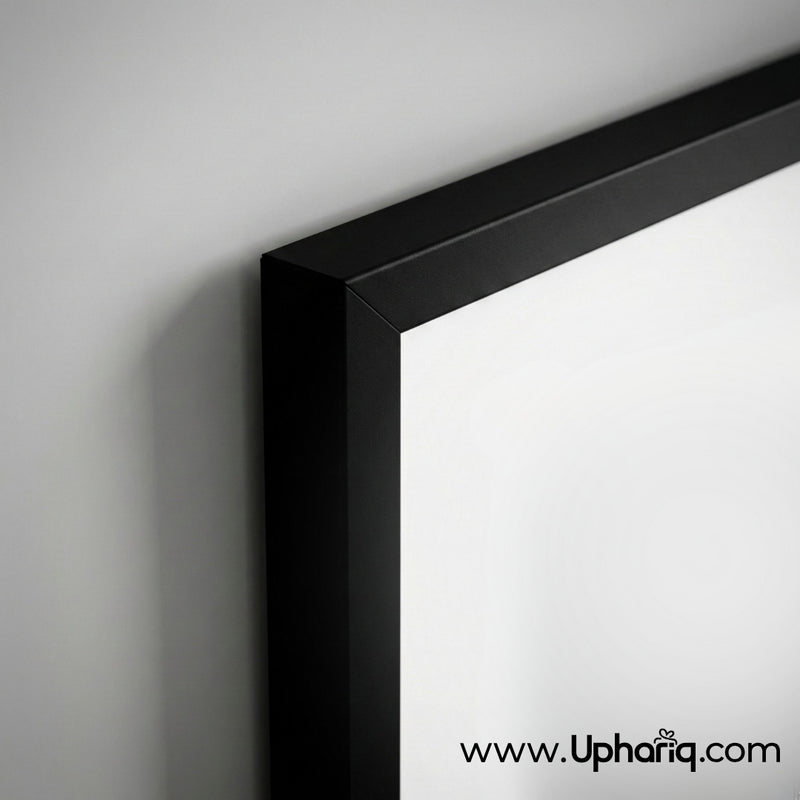 Close-up of slim black frame corner on Bhagavad Gita photo frame showing clean edge finish