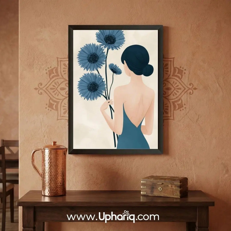 Minimalist woman holding blue flowers framed wall art for living room decor