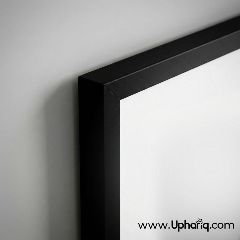 Peacock photo frame slim 0.5 inch black fiber corner close-up showing clean mitered join and matte non-reflective frame surface against grey wall
