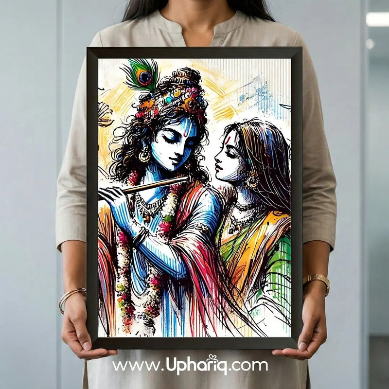 Woman holding Radha Krishna photo frame in both hands showing actual 12x18 inch size with matte 300 GSM print and black fiber border
